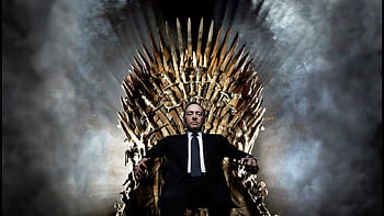 man sitting on throne