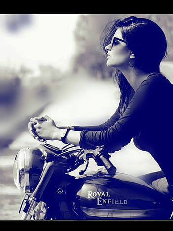 Woman in white and black floral shirt and blue denim jeans sitting on  motorcycle photo – Free Solo Image on Unsplash