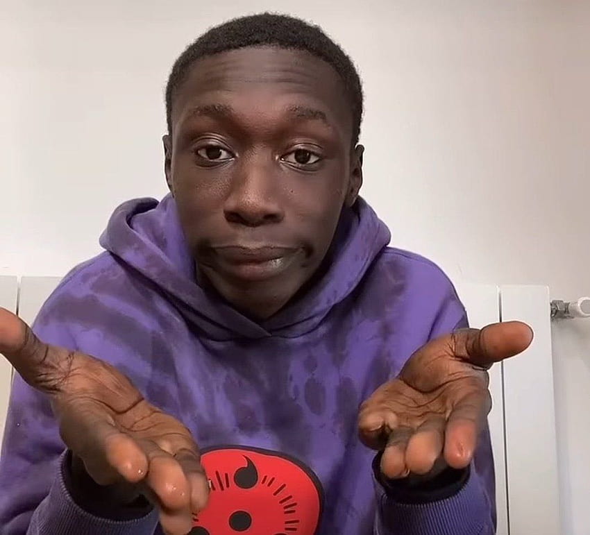 Khaby Lame Unhappy Hands Expression Goes Viral on TikTok and Instagram HD wallpaper