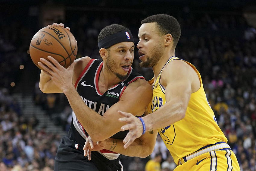 Warriors Steph Curry et Blazers Seth Curry échangent des maillots Fond d'écran HD