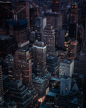 Man sitting on roof top during nighttime – Human on Unsplash. City ...