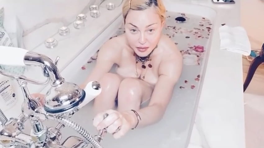 Madonna dice que el coronavirus es 'el gran ecualizador', en un video de la bañera fondo de pantalla