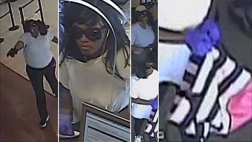 Zwei Frauen auf der Flucht nach einem „Übernahme“-Überfall auf die Chase-Bank in North Hills, Los Angeles, Bankräuberin HD-Hintergrundbild