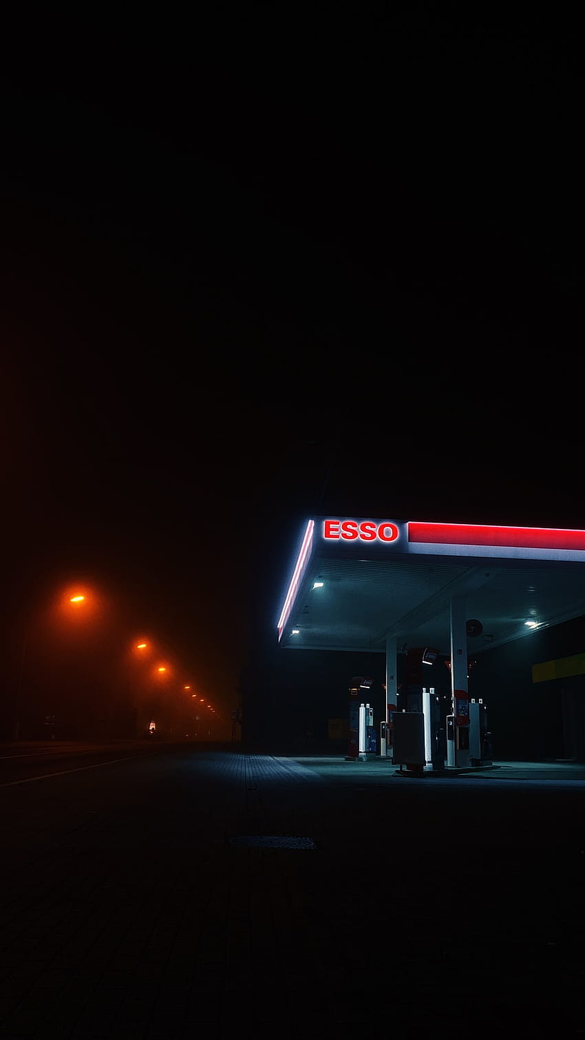 Noche de gasolinera, gas neón. fondo de pantalla del teléfono