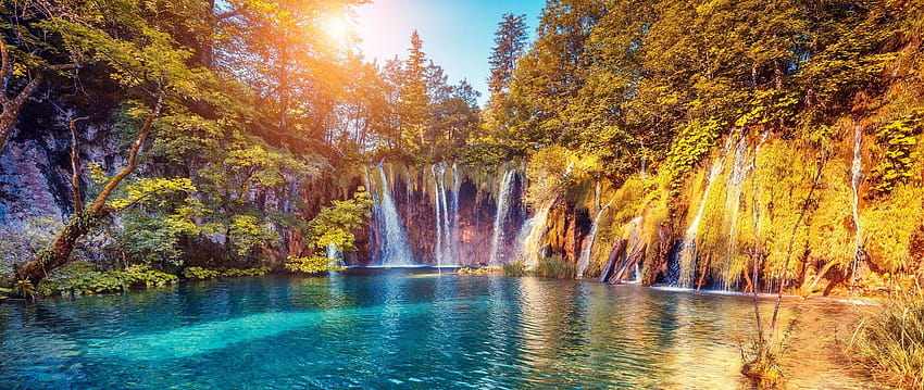 2560x1080 waterfall, precipice, sunlight, summer, bright, trees dual wide backgrounds, summer bright HD wallpaper