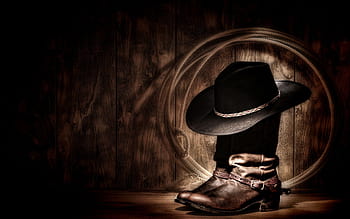 dak prescott in cowboy hat and boots