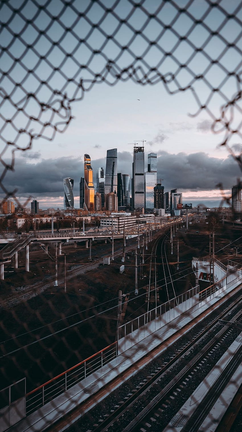 938x1668 city, fence, mesh, moscow, russia, moscow iphone HD phone wallpaper