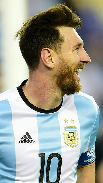 Download Lionel Messi Dons Argentina's Striped National Jersey Wallpaper |  Wallpapers.com