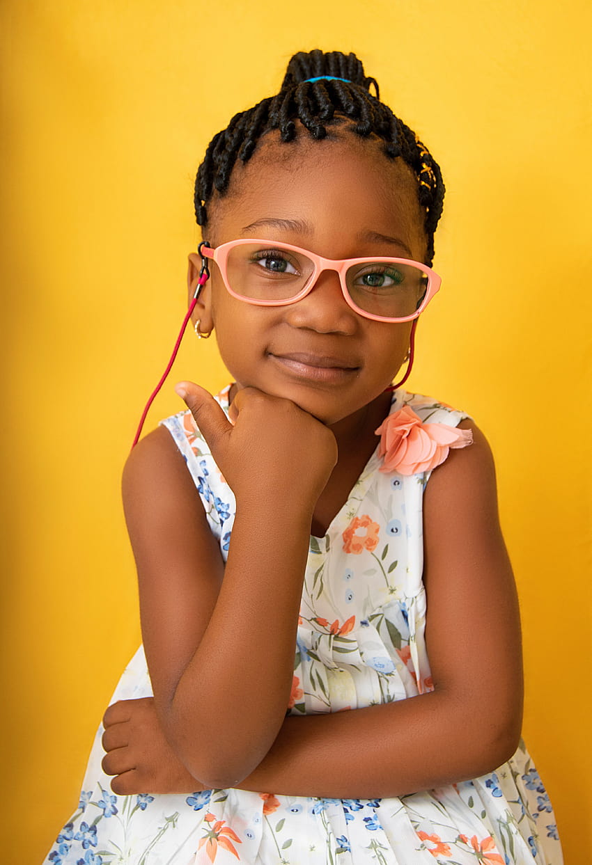 Smiling black girl in glasses touching chin and looking at camera · Stock, black girl with glasses HD phone wallpaper