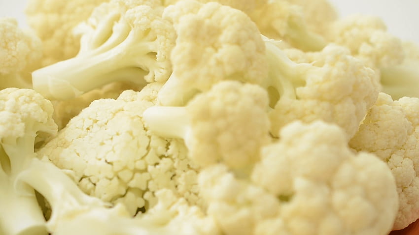 Cauliflower on a board. Shooting in the movement. Stock Video HD wallpaper