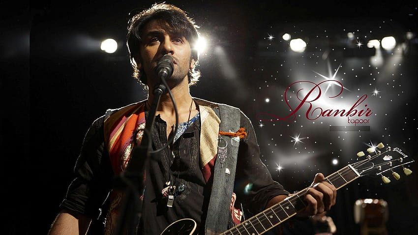 Actor Ranbir Kapoor cantando con guitarra en película india Rockstar, estrellas de rock fondo de pantalla