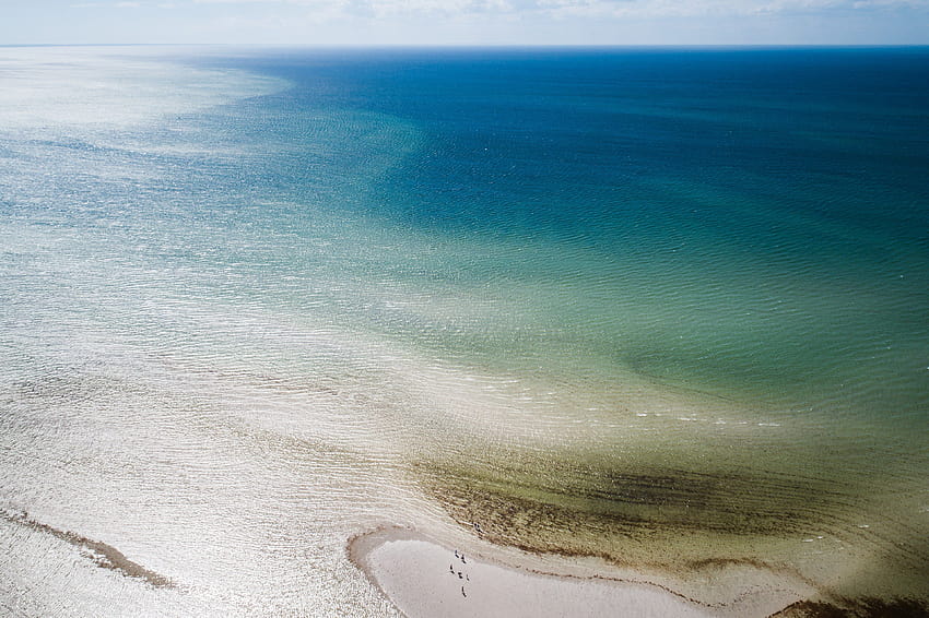 drone aerial view of the shallow waters near a sand beach at, ocean waters aerial view HD wallpaper