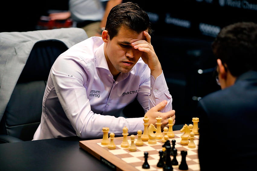 Magnus Carlsen ha vinto di nuovo il campionato mondiale di scacchi, ma qualcosa è cambiato Sfondo HD
