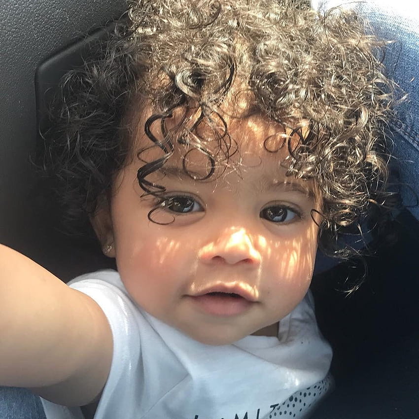 baby with curly hair