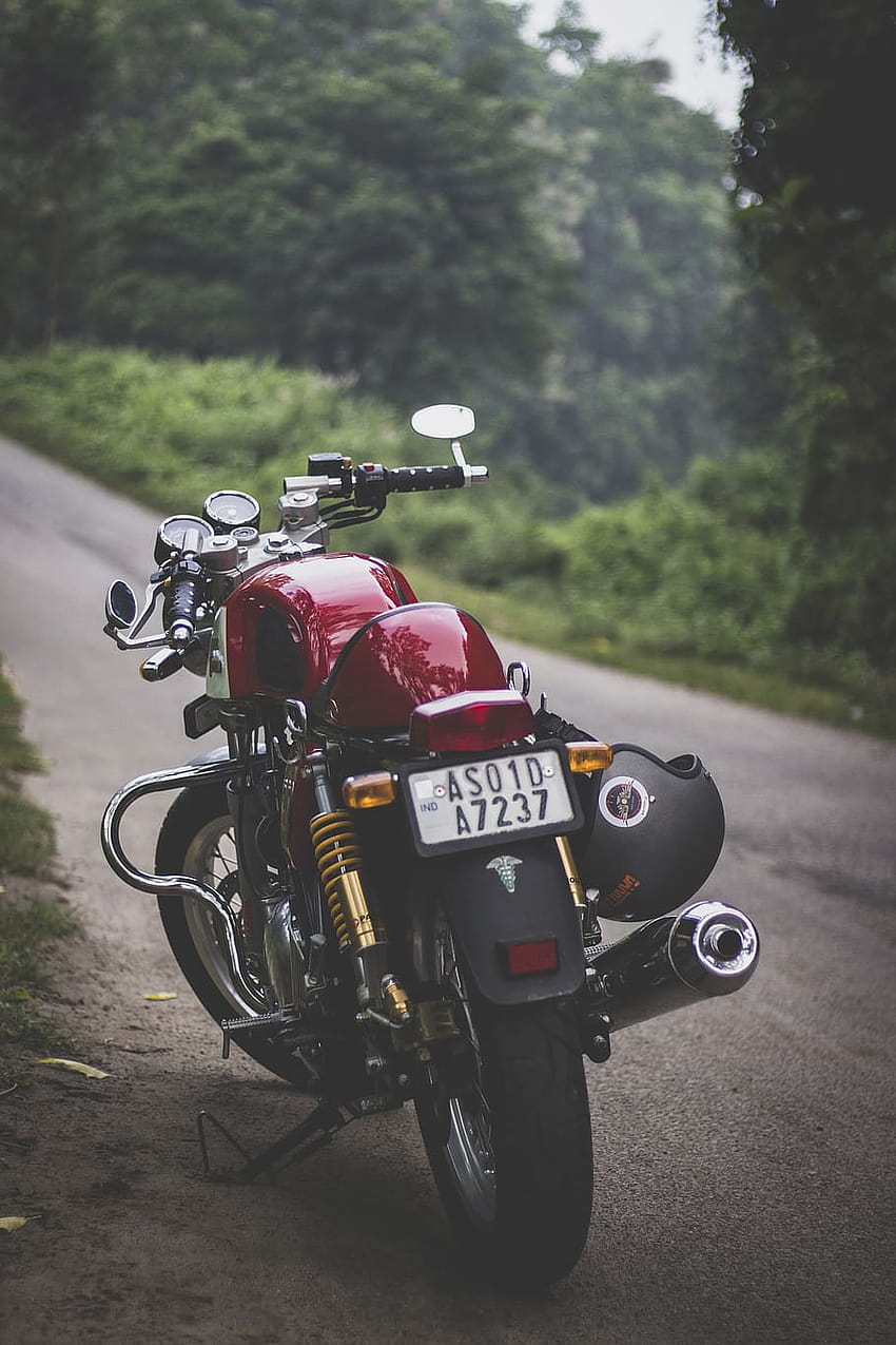 : Red Motorcycle Parked, guwahati, motorbike, triumph, triumph iphone HD phone wallpaper