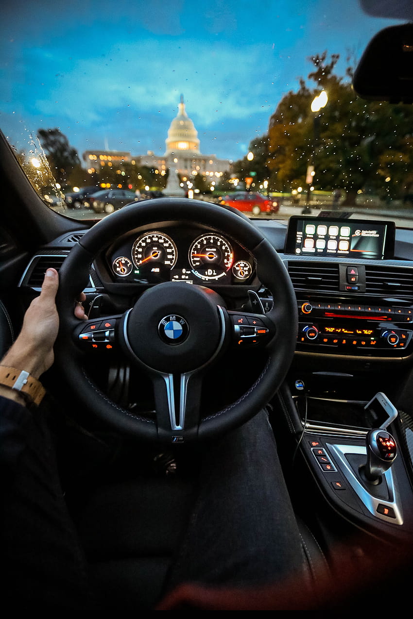 Person Holding Bmw Steering Wheel · Stock HD phone wallpaper