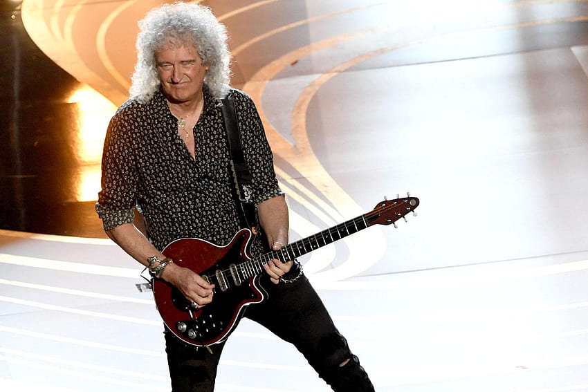 Queen guitarist Brian May hits out at airline for 'hacking HD wallpaper