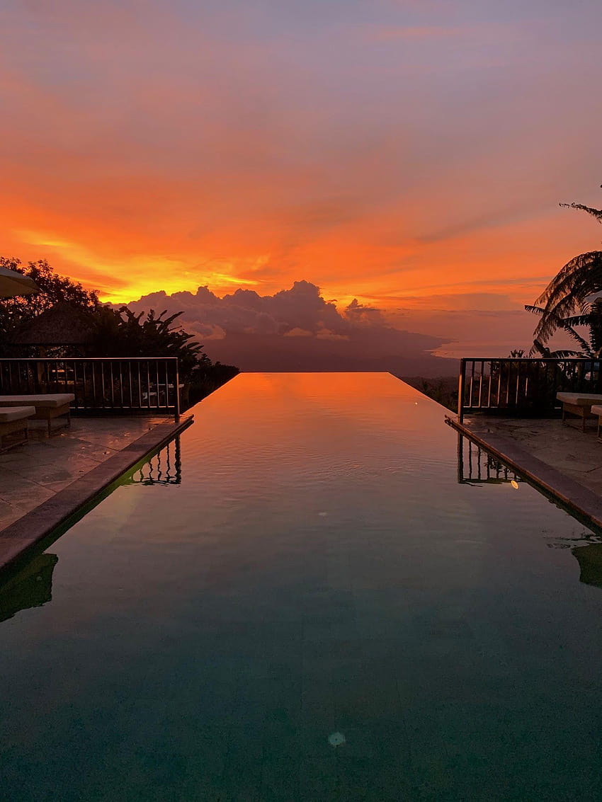 The Infinity Pool site is perfect to enjoy beautiful sunsets, infinity pool sunset HD phone wallpaper