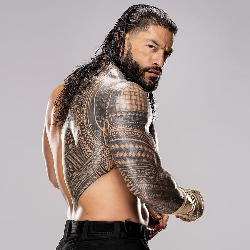 WWE Superstar Roman Reigns with Tattoos