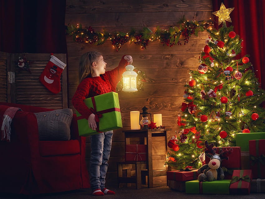 Happy child girl look at Christmas tree, lamp, looks like christmas HD wallpaper