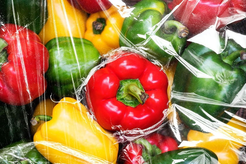 Fresh bell peppers covered with plastic wrap textured backgrounds HD wallpaper