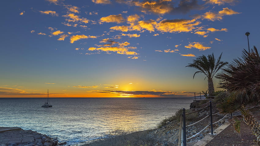 Sunset On The Playa Fanabe Beach In Tenerife, Spain HD wallpaper