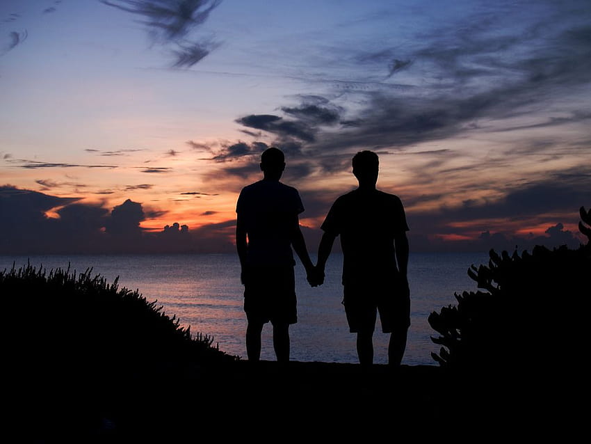 Gay Couple Holding Hands At Dawn HD wallpaper