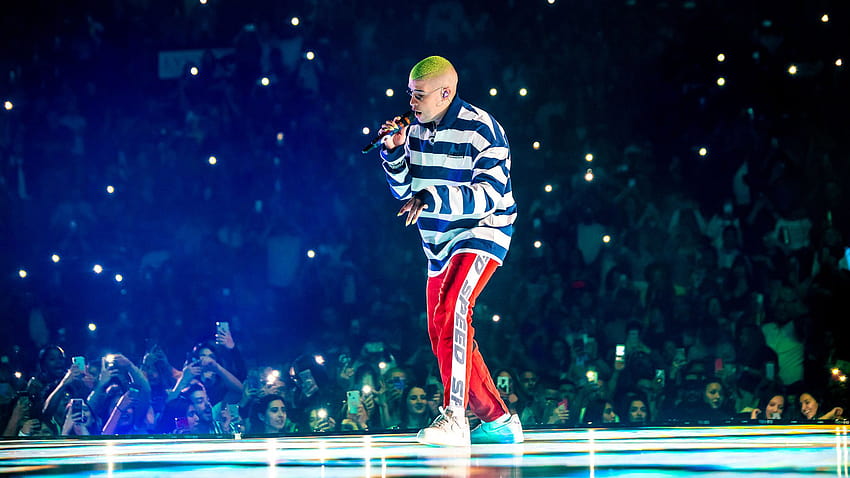 Bad Bunny Aesthetic Is Singing In Front Of Fans Wearing Striped Tshirt And Red Track Pants Music HD wallpaper