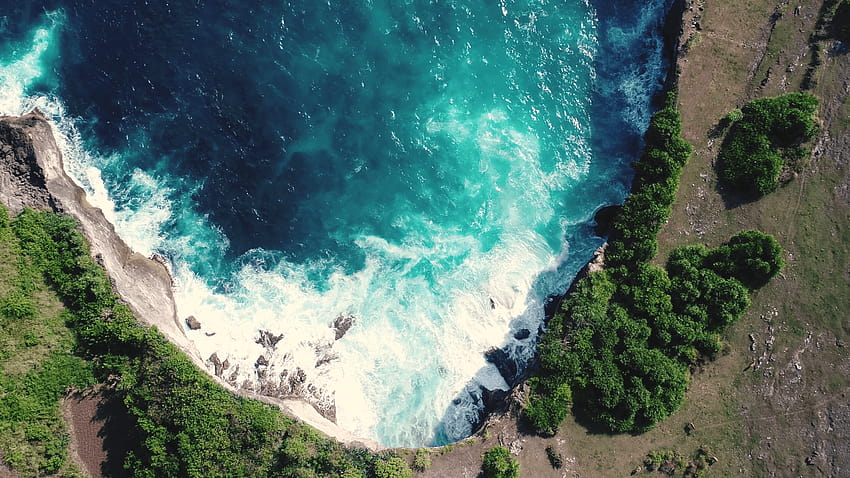 Aerial view by drone camera. Rocky coast with high cliffs, sea surf with breaking waves on the coast, Nusa Penida, Pasih Uug, Broken Beach. Ocean, rocky shore drone view HD wallpaper