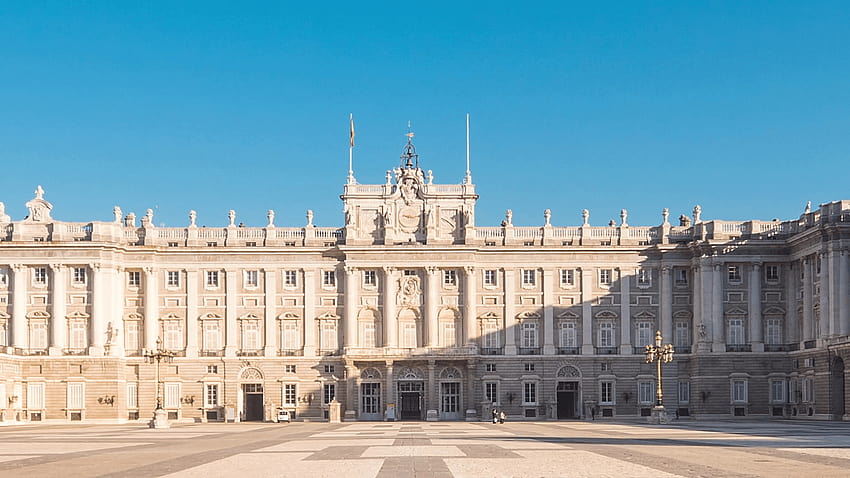 palacio real de madrid timelapse alejar cielo azul sol iluminando el fondo de pantalla