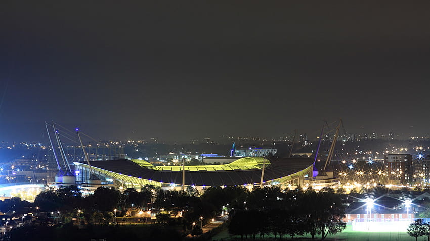 Manchester City Etihad Stadium en la noche, estadio de la ciudad de Manchester fondo de pantalla