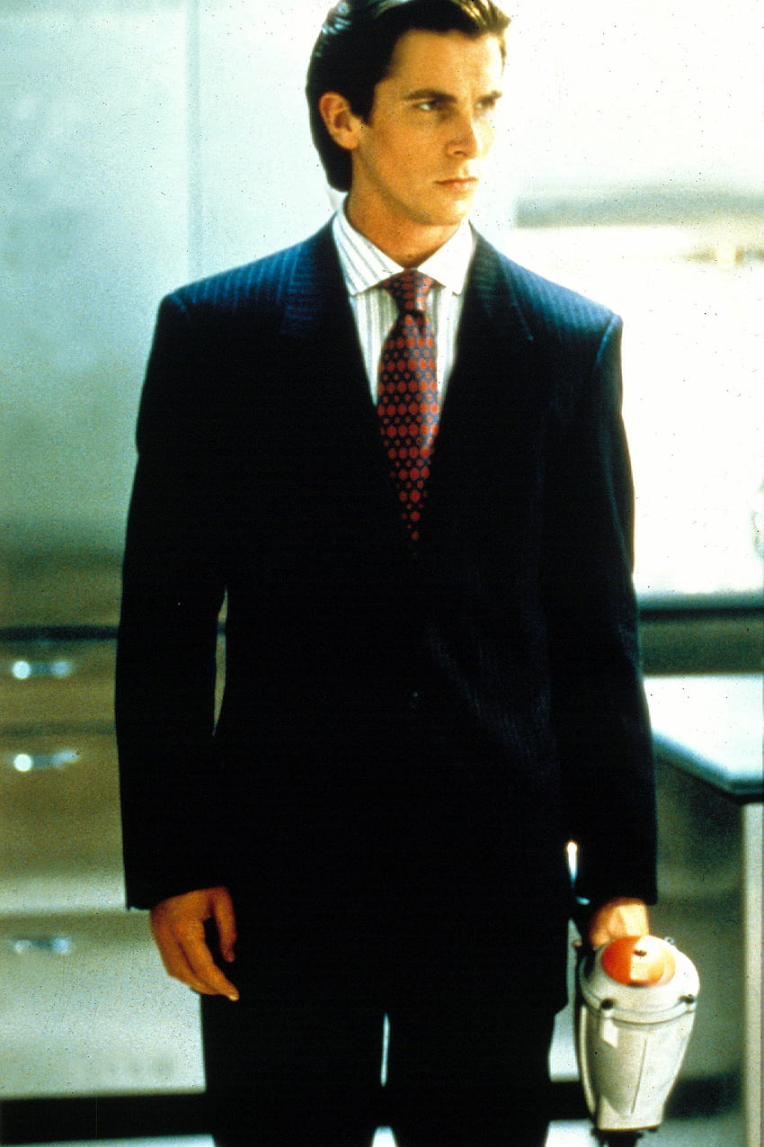 Patrick Bateman von American Psycho verkörperte den Geschäftsmannstil der 1980er Jahre HD-Handy-Hintergrundbild