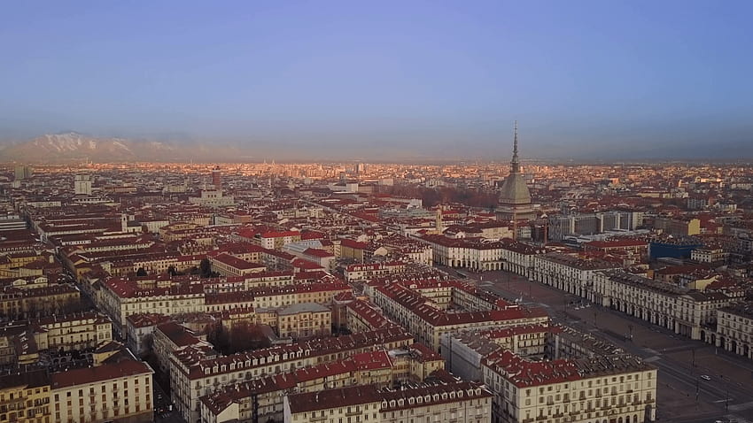 aerial drone flying over turin city center at sunrise Stock Video HD wallpaper
