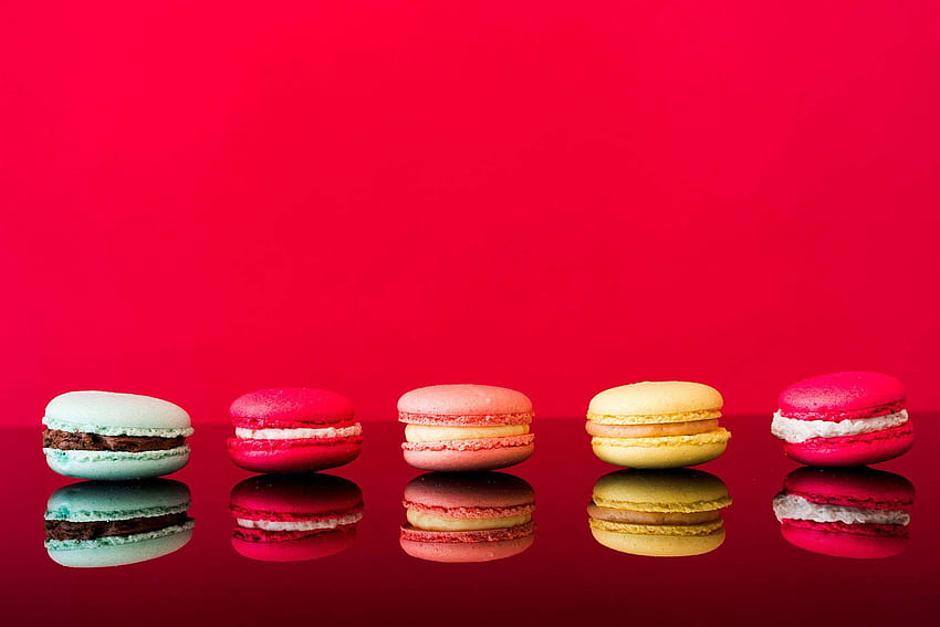 Colorful Yummy Macarons on Glossy Table and Red Backgrounds, background macaroon HD wallpaper