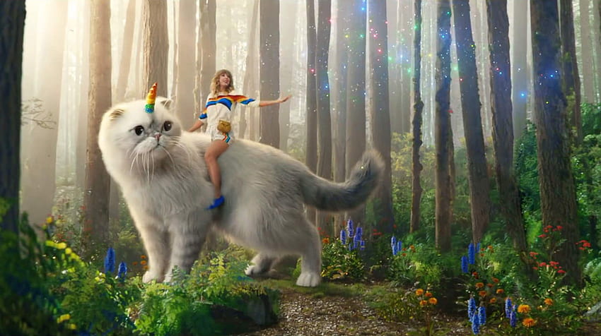 Taylor Swift reitet eine Einhorn-Olivia-Katze: TaylorSwift HD-Hintergrundbild