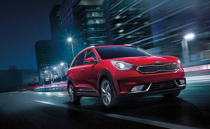 2019 Kia Niro EV red color night on road in city lights backgrounds HD ...