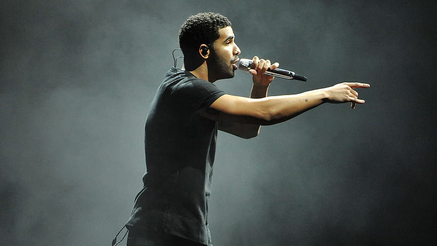 Drake Is Holding Mike Facing One Side Wearing Black Dress In Fog Backgrounds Drake HD wallpaper