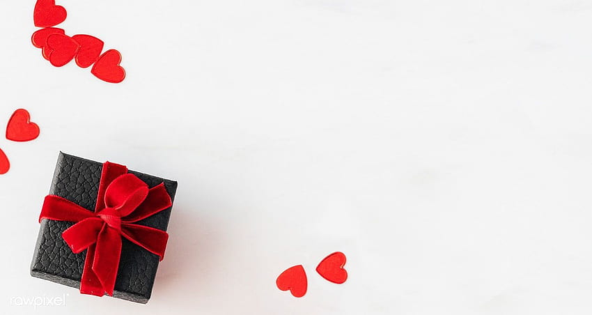 Regalo negro envuelto con un lazo rojo, caja de San Valentín fondo de pantalla