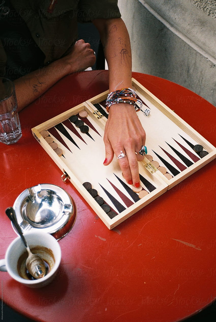 A young girl playing backgammon by Aleksandra Martinovic HD phone wallpaper