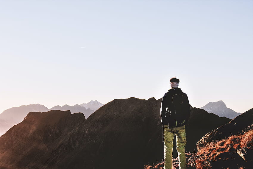 Person Standing on Top of the Mountain · Stock, man on top of mountain ...