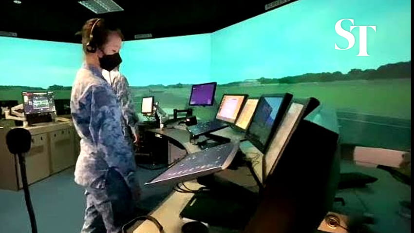 Trainees at work in the AFTC's air traffic control simulator HD wallpaper