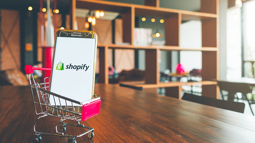 4 formas de acelerar tu sitio de Shopify fondo de pantalla