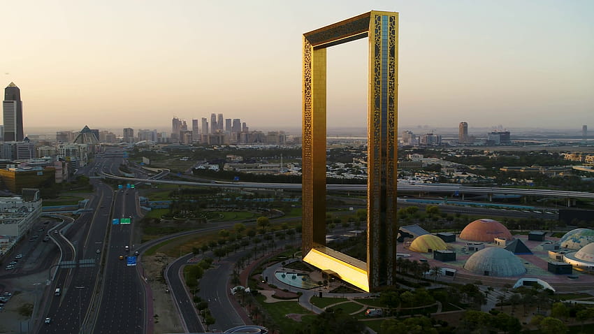 Vue aérienne du point de repère du cadre de Dubaï pendant le coucher du soleil, Dubaï, U.A.E Stock Video Footage Fond d'écran HD
