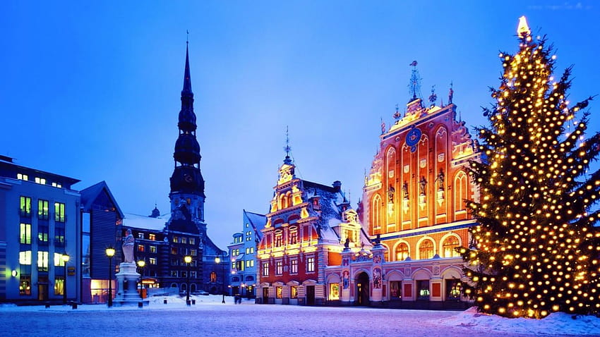 Riga Latvia buildings houses church bell tower square tree tree lights night sunset city HD wallpaper