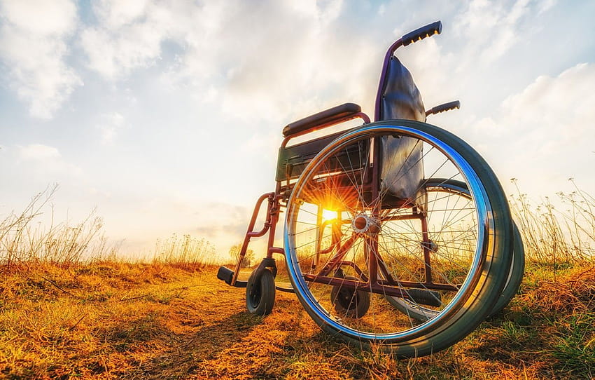 Disabled woman with arms outstretched on the beach from Pikwizard