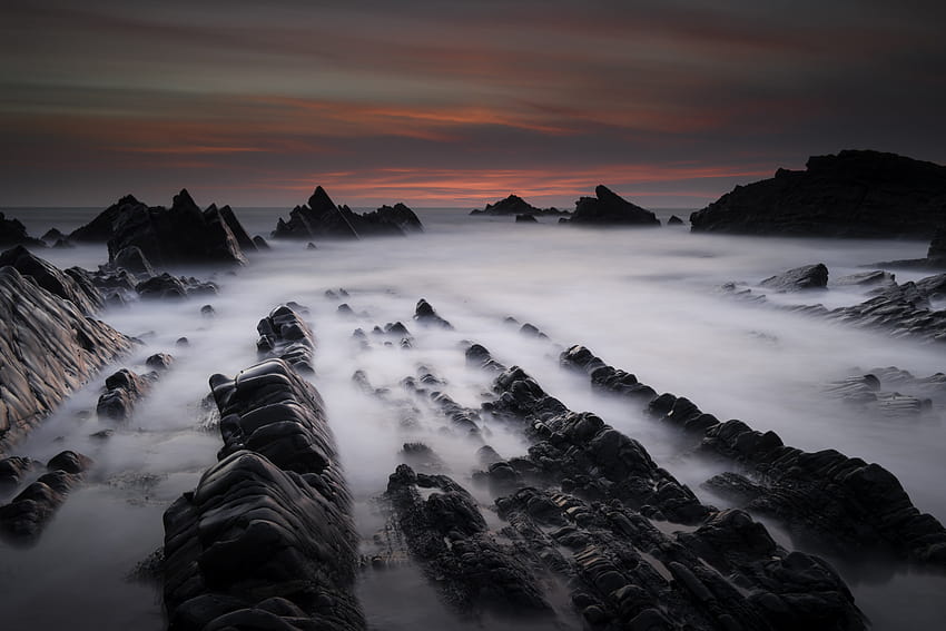 Timelapse graphy of rocky mountain covered by sea of, hartland quay rocks HD wallpaper