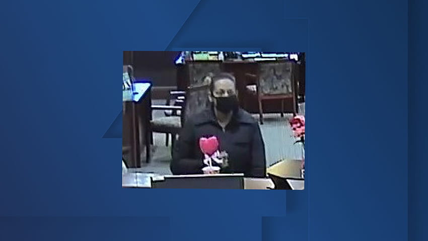 FBI seeks help to identify Claycomo bank robbery suspect, female bank robber HD wallpaper