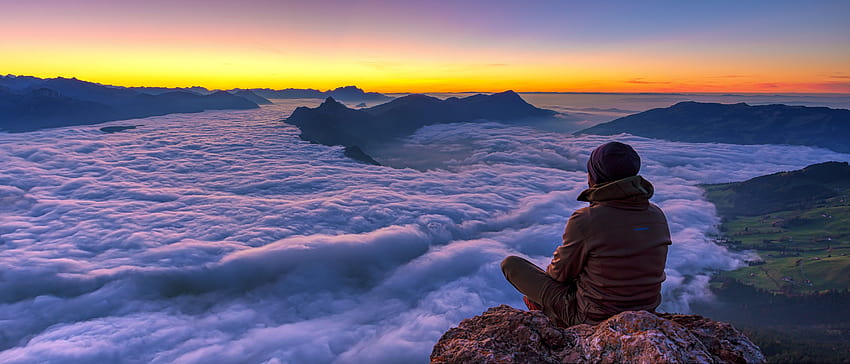 Man seating on the peak of the mountain, man on top of mountain HD wallpaper