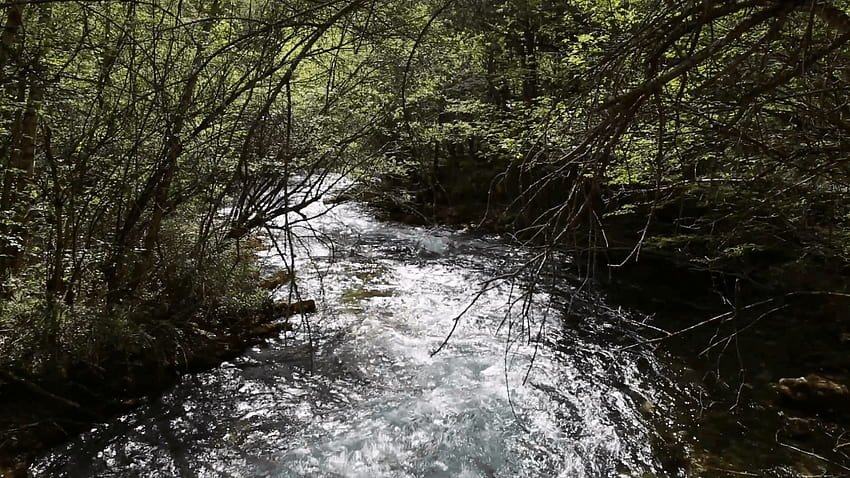 a stream at jiuzhaigou valley national park in china Stock Video HD wallpaper