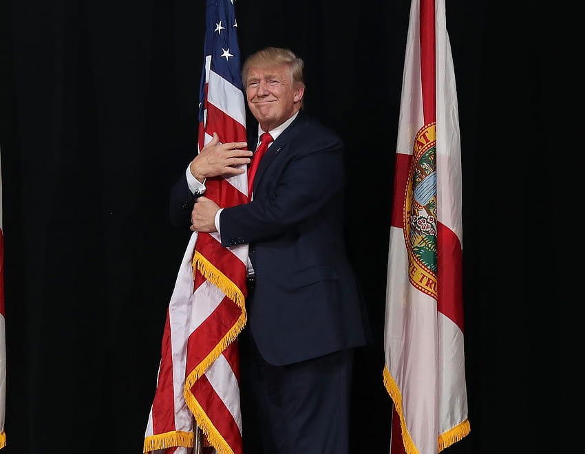 To Celebrate Flag Day, the White House Tweeted a Weird of Trump Hugging Old Glory, donald trump flags HD wallpaper